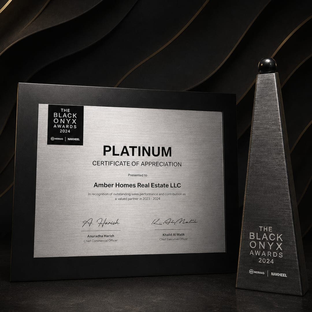 Amber Homes Real Estate — Platinum Sales Agency 2024, awarded by Meraas, Nakheel & Dubai Holding (award trophy and certificate)